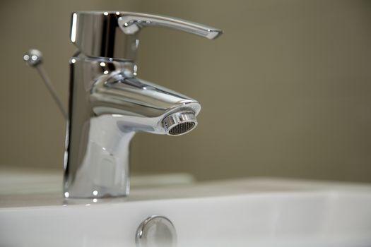 Close Up of water crane in bathroom