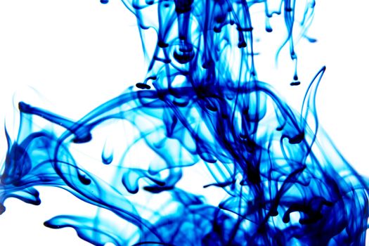 Vegetable ink poured into water with white background.