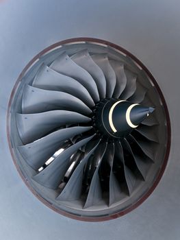 Turbine of jet engine on wide-body passenger airplane.