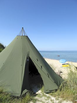 With the sami tent, lavvu, at the Black Sea Coast