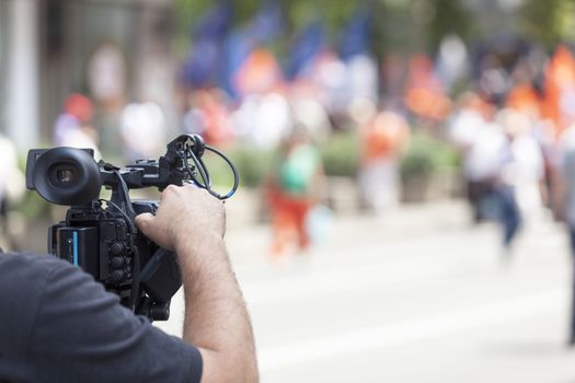 Covering a street protest using video camera