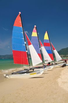 sail boat on patong beach, phuket, thailand