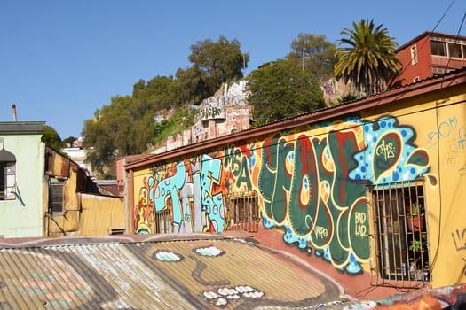 Colourful urban art decorating buildings in the world heritage city of Valparaiso in Chile