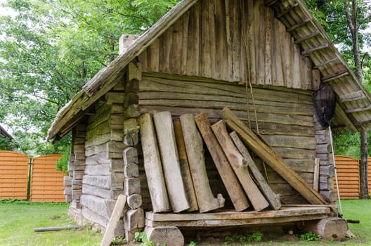 old ancient rural log house