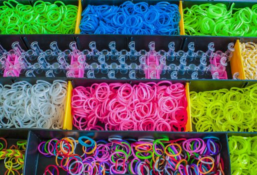 Colorful Rainbow loom rubber bands in a box