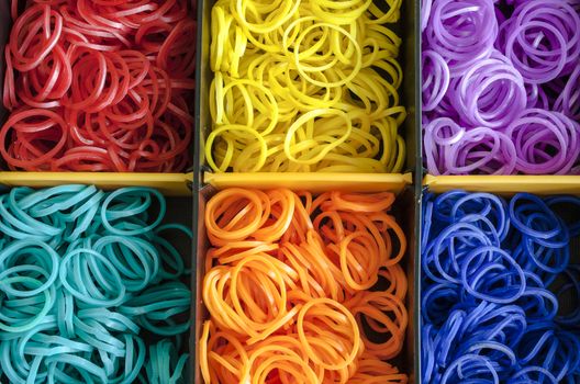 Colorful Rainbow loom rubber bands in a box
