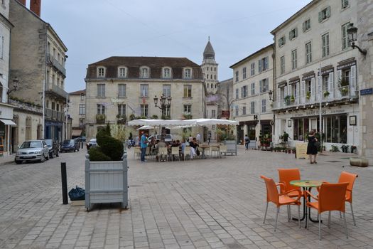 City hall place, Périgueux; France. Orange chairs in foreground