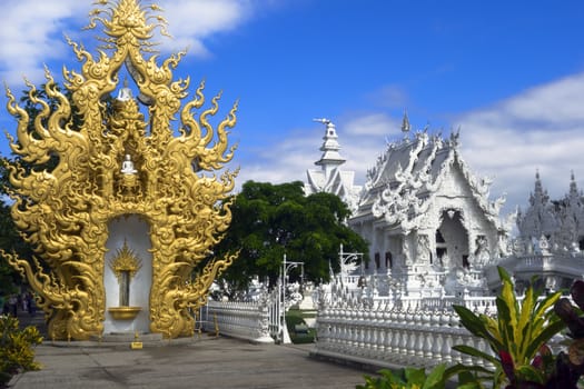 Wat Rong Khun. More well-known among foreigners as the White Temple, is a contemporary unconventional Buddhist temple in Chiang Rai.