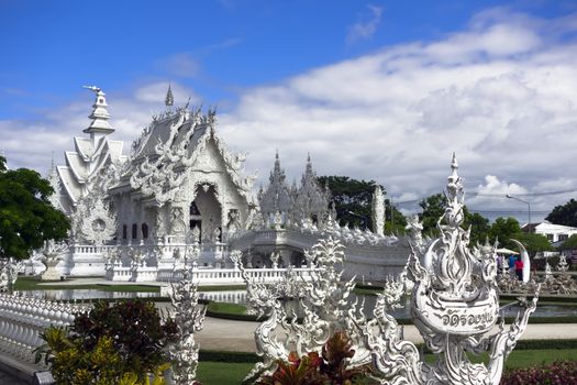 Wat Rong Khun. More well-known among foreigners as the White Temple, is a contemporary unconventional Buddhist temple in Chiang Rai.