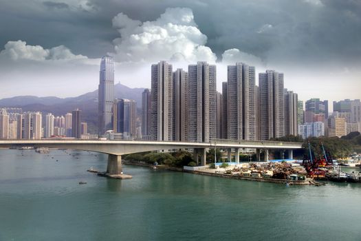 View of the residential area of Hong Kong on a background cloudy sky