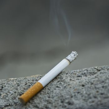 cigarette closeup in border line