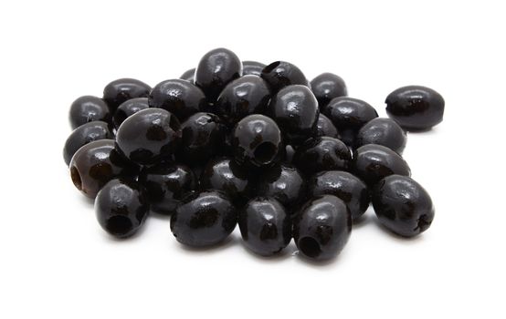 Pitted black olives in oil, isolated on a white background