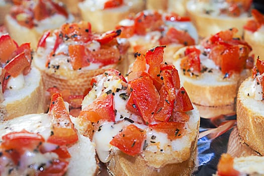 Bruschetta with tomato mozzarella garlic and fresh herbs