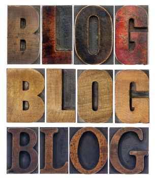 blog word in isolated antique wood letterpress printing blocks, stained by color inks, a collage of words in a variety of fonts