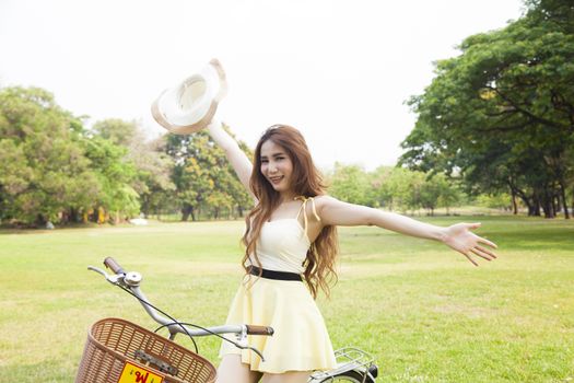 Public feeling refreshed and relaxed in the park. Woman relaxing in the park.