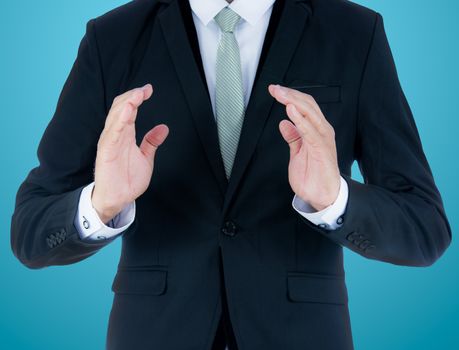 Businessman standing posture show hand isolated on over blue background