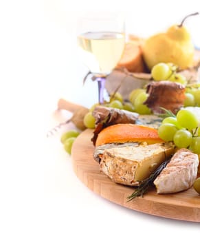 Various types of cheese and wine isolated on white background