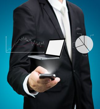 Businessman standing posture hand hold mobile phone analyze graph isolated on blue background