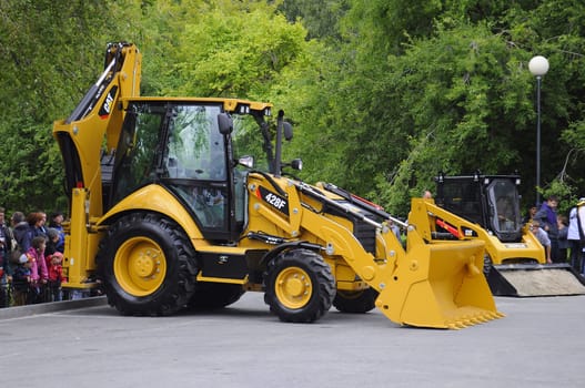 City Day of Tyumen, on July 26, 2014, show of dancing excavators