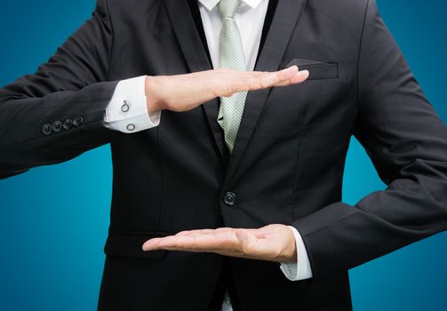 Businessman standing posture show hand isolated on over blue background