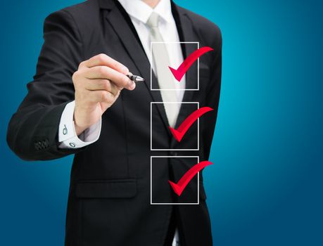 businessman checking mark checklist marker Isolated on blue background