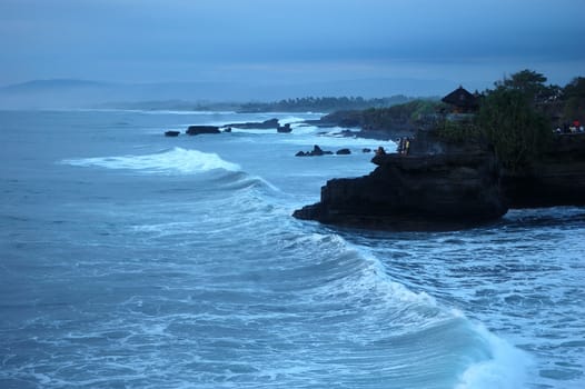 tanah lot holy temple that located in bali, indonesia