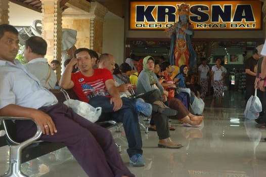 bali, indonesia-november 24, 2012: people at krisna souvenir shop-one of famous shopping centre among tourists in bali, indonesia.