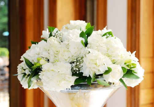 Wedding reception floral arrangement, closeup detail of white flowers