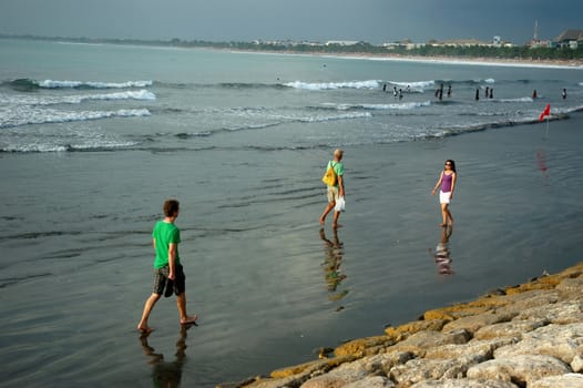 Bali, Indonesia - November 25, 2012: People activities at Kuta beach, Bali-Indonesia.