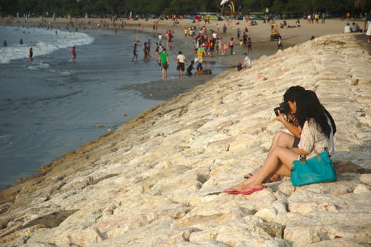 Bali, Indonesia - November 25, 2012: People activities at Kuta beach, Bali-Indonesia.