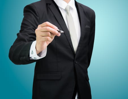 Businessman standing posture hand hold a pen isolated on over blue background