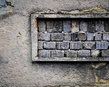 background or texture bricked up window in old wall