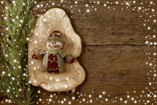 Christmas background snowman on wooden background copy space