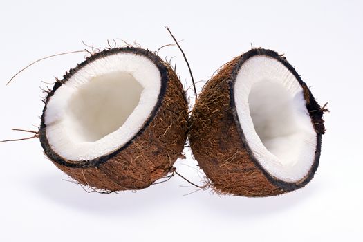 cut coconut isolated on white background