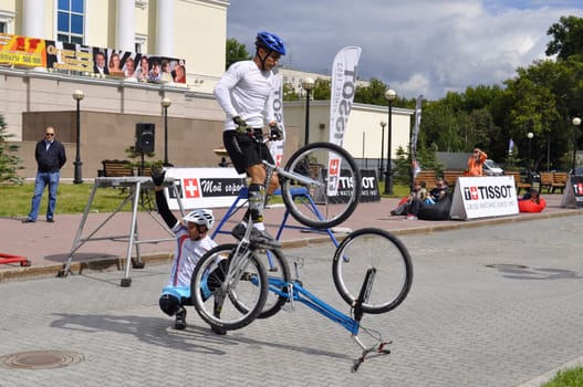 Timur Ibragimov and Mikhail Sukhanov's performance, champions of Russia on a cycle trial. City Day of Tyumen on July 26, 2014