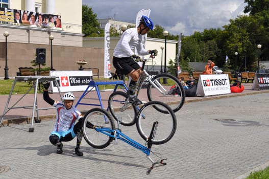 Timur Ibragimov and Mikhail Sukhanov's performance, champions of Russia on a cycle trial. City Day of Tyumen on July 26, 2014