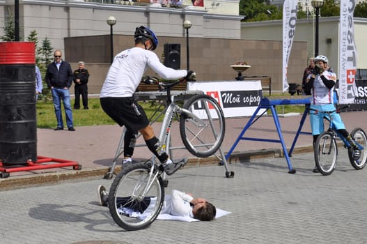 Timur Ibragimov and Mikhail Sukhanov's performance, champions of Russia on a cycle trial. City Day of Tyumen on July 26, 2014