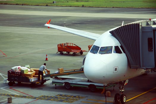 Airplane loading and ready starting to fly