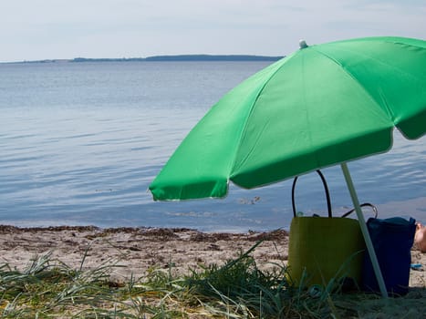Colorful beach umbrella on a summer sunny day