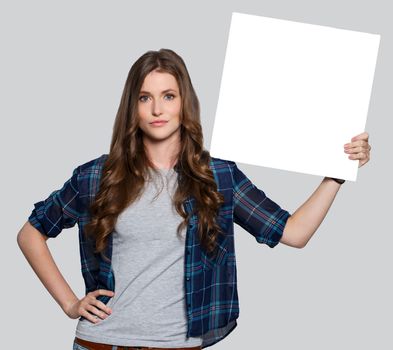 Beautiful woman with white billboard