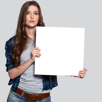 Beautiful woman with white billboard