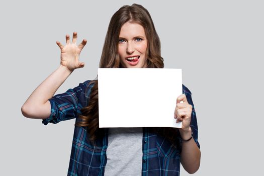 Beautiful woman with white billboard