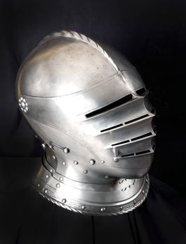 Iron helmet of the medieval knight. Very heavy headdress