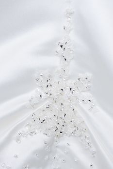 Macro closeup of brides dress detail