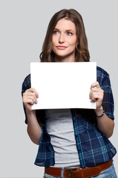 Beautiful woman with white billboard