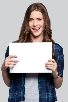 Beautiful woman with white billboard