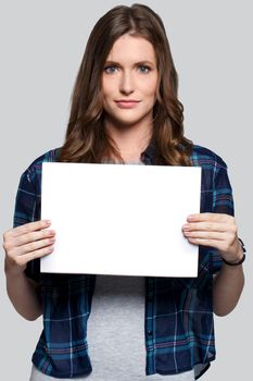 Beautiful woman with white billboard