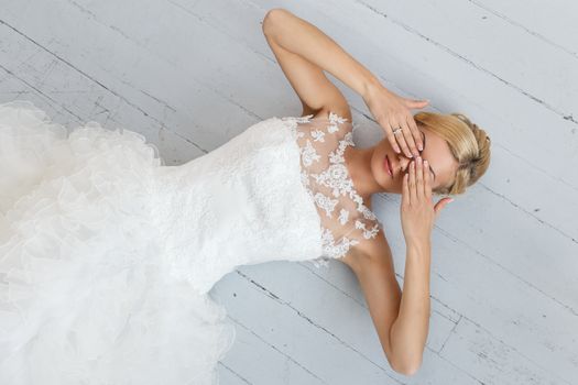 Wedding. Attractive bride on the floor