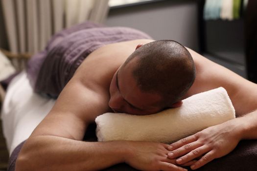 Beauty, health. Man in spa salon