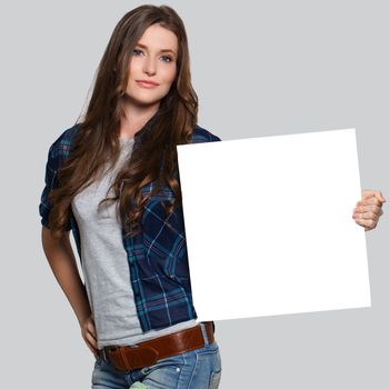 Beautiful woman with white billboard